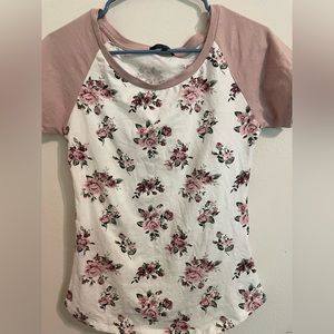 Mostly white blouse with cute flowers size L but runs small